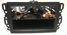 Load image into Gallery viewer, Dash kit and Wire Harness for Installing a New Radio into a Chevy Avalanche(2007-2013), Equinox(2007-2009), Express Van (2008-2015), Impala(2006-2013), Monte Carlo(2006-2007)Â
.